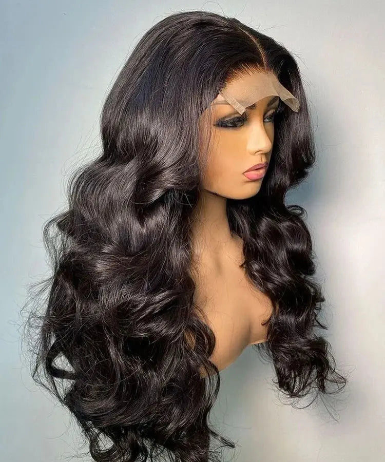 A long, natural black wavy 5x5 lace closure wig  from WigOutlets