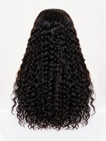 Long black water wave human hair wig shown from the back | WigOutlets